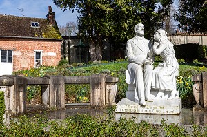  STATUE REPRESENTING THERESE ASKING HER FATHER FOR PERMISSION TO ENTER THE CARMELITE CONVENT, GARDEN OF THE BUISSONNETS HOUSE, SAINTE-THERESE OF THE CHILD JESUS, LISIEUX, PAYS D'AUGE, CALVADOS,  NORMANDY, FRANCE